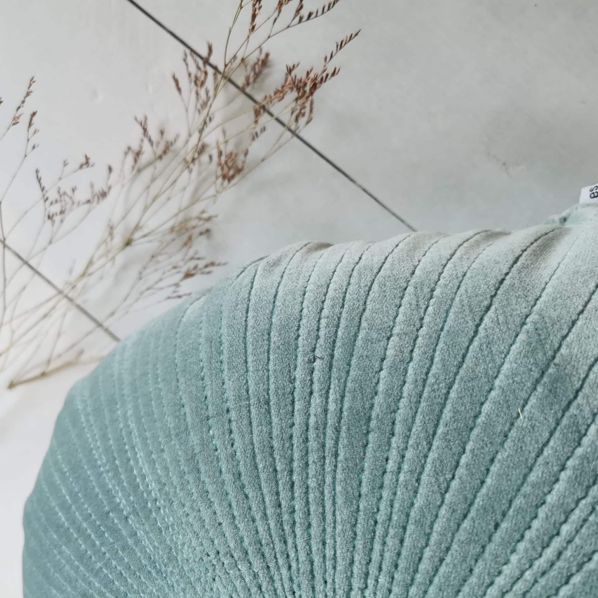 détail tissus oursins velours vert d'eau