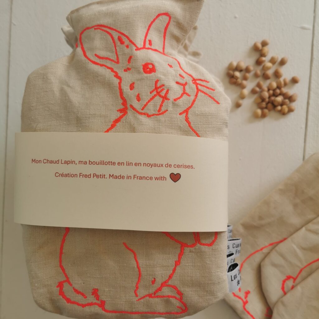 bouillotte lapin fluo noyaux de cerises